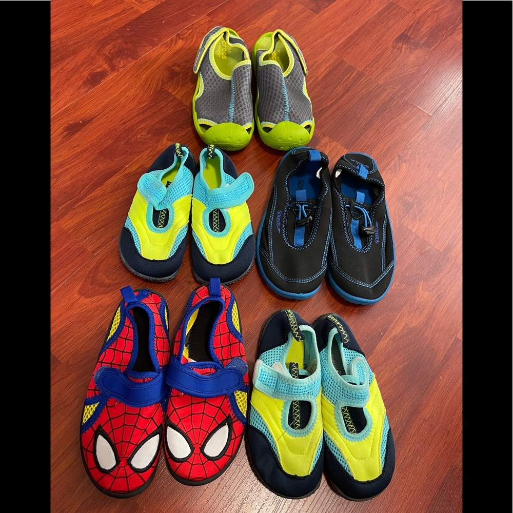 Gently used boys water shoes.